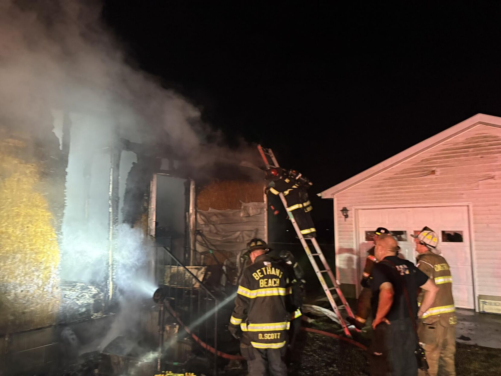 Millville house fire breaks through roof, no injuries reported